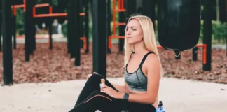 Young Girl eating raw rev glo protein bar