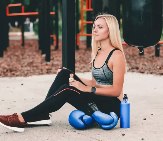 Raw Rev GLO Protein Bars vs. Healthy Truth Protein Bars Young Girl eating raw rev glo protein bar