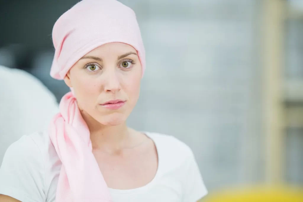 A white lady suffering from cancer.