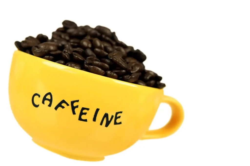 A cup full of caffeine beans. 
