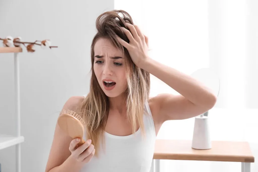 A lady facing hair loss. 