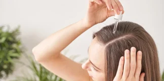 Look Younger with Moringa Oil for Hair: SVA Organics Moringa Oil vs. Green Virgin Products Moringa Oil Girl applying moringa oil in her scalp