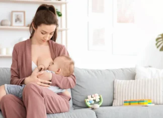 Mother lactating her baby