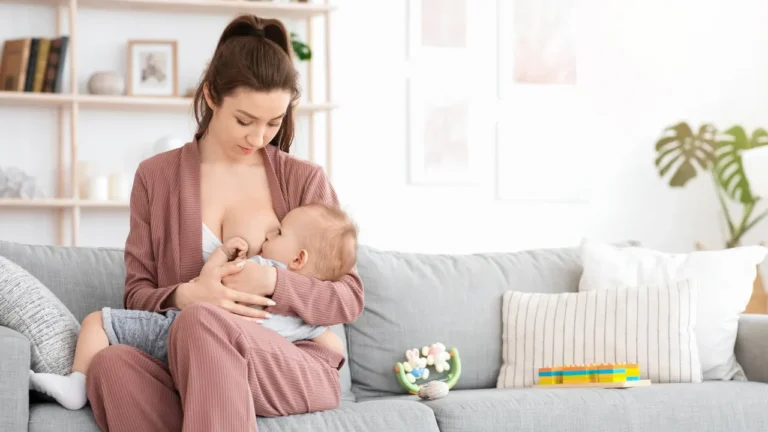 Mother lactating her baby